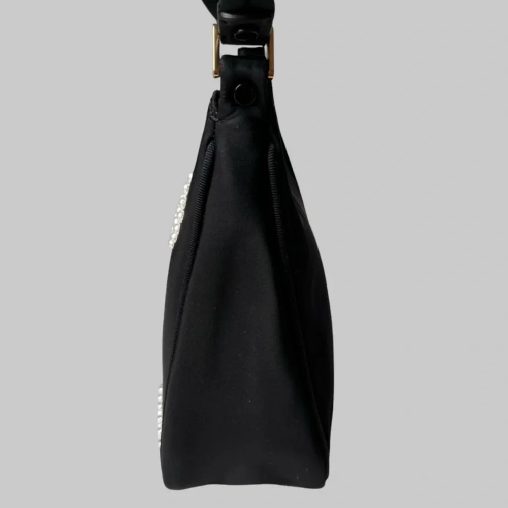 Kate Spade Embellished durable woven nylon with leather trim
Matte lining - Picture 9 of 12